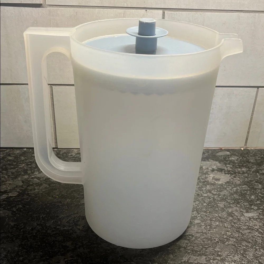 Half Gallon Tupperware Translucent White Pitcher with blue Lid. Great shape